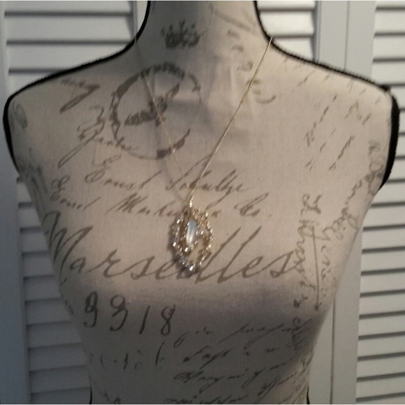 Alexis Bittar Frosted White Lucite with Crystals Necklace in gold setting.